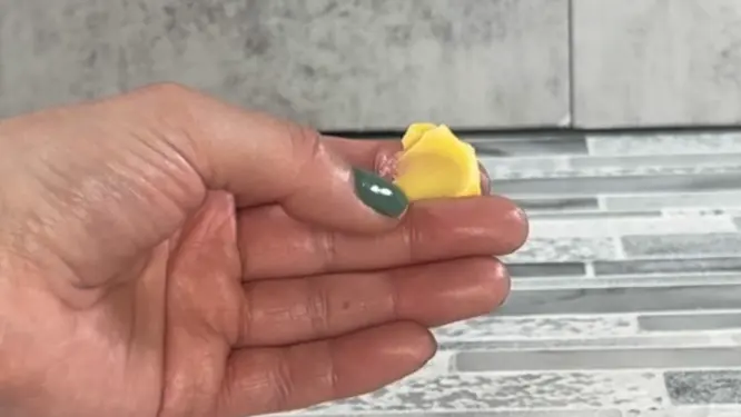 smooshing a lotion dot between my fingers