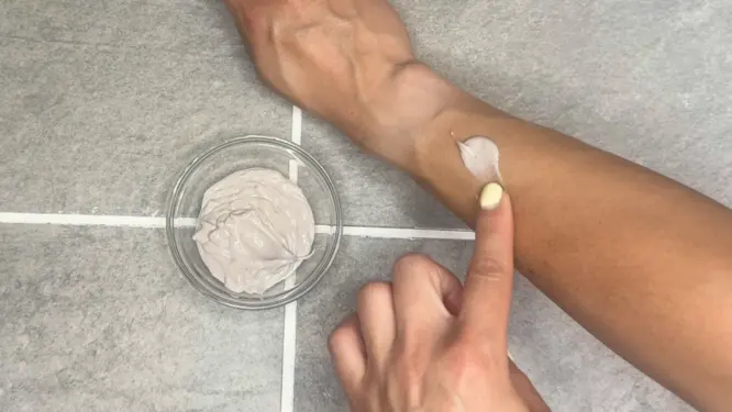 applying shimmer lotion