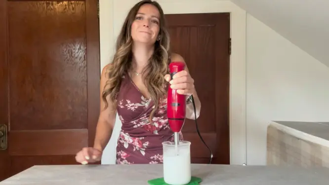 mixing lotion with immersion blender