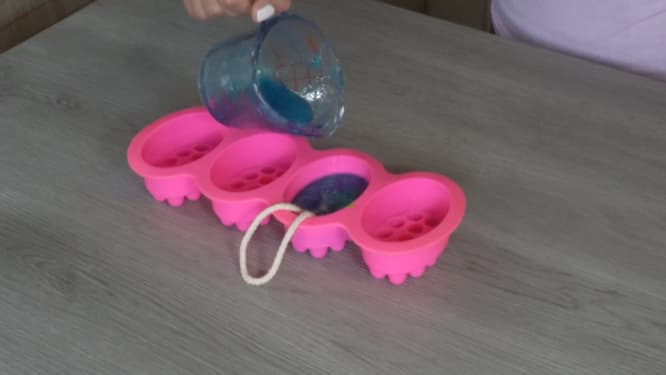 pouring soap over cotton rope