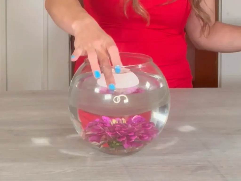 Adding floating candle to centerpiece