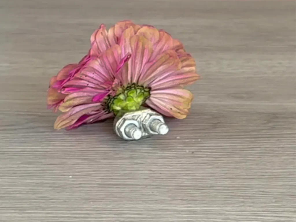 U ring attached to flower to get it to sink