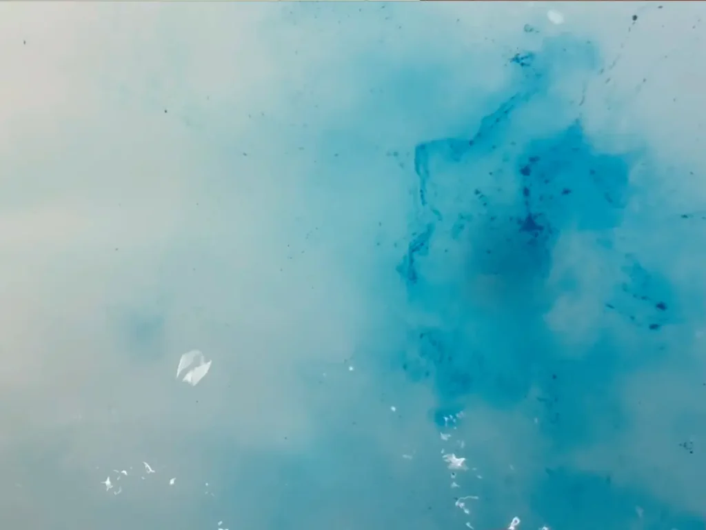 adding lake dye to tub to show the color it adds