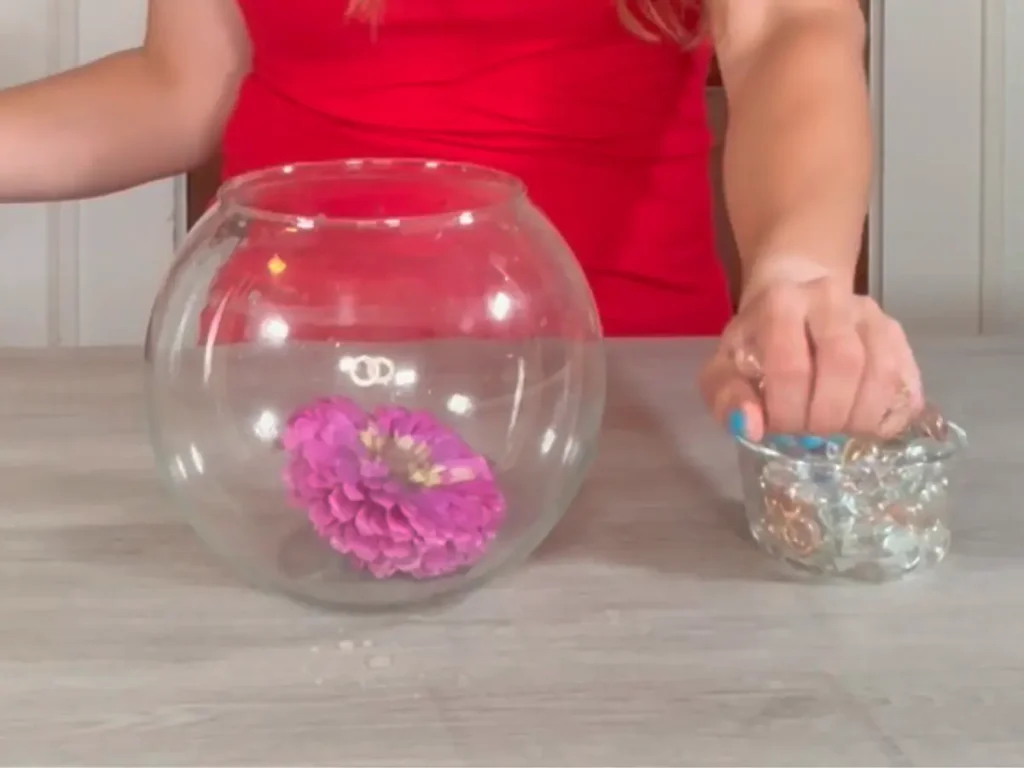flower in bowl and placing glass beads