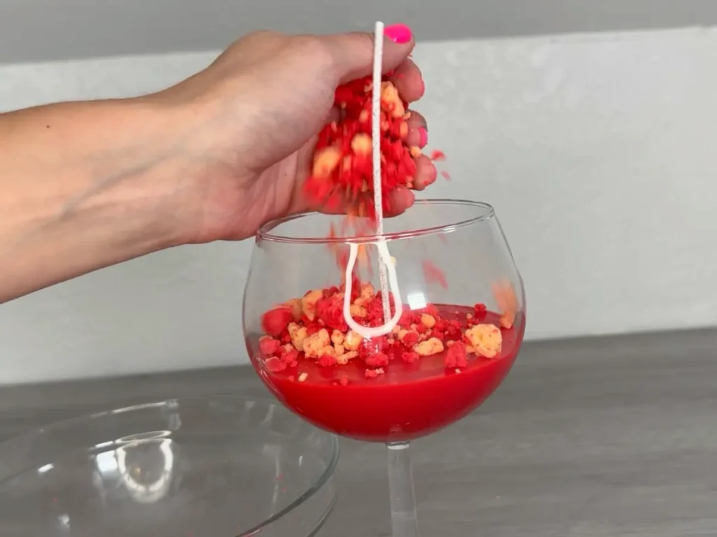 adding wax crumble to candle