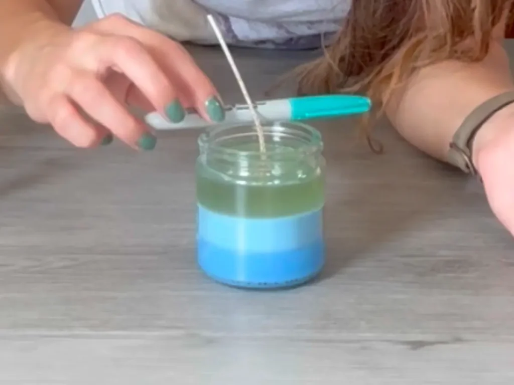 centering candle wick with a sharpie