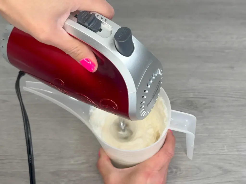 mixing wax with hand mixer