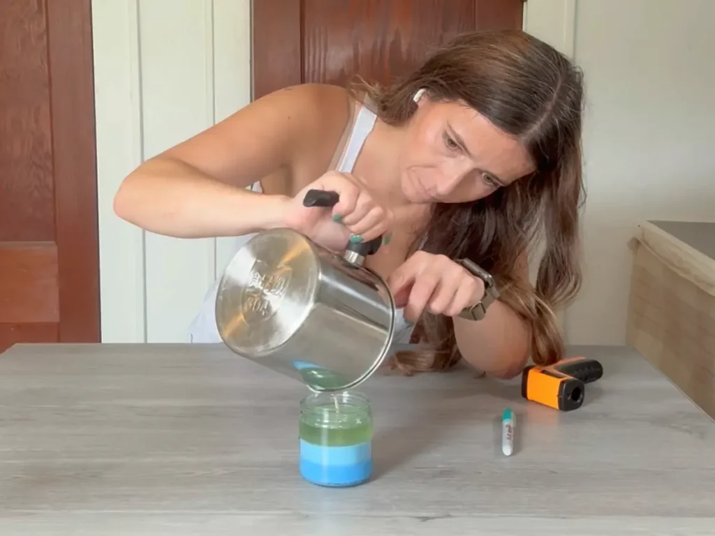 pouring layer 3 of ombre candle