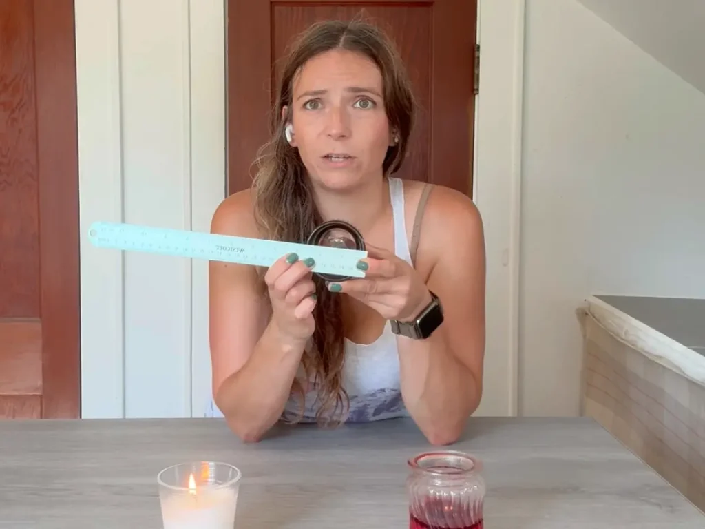 summerrain (jami) showing how to measure candle diameter