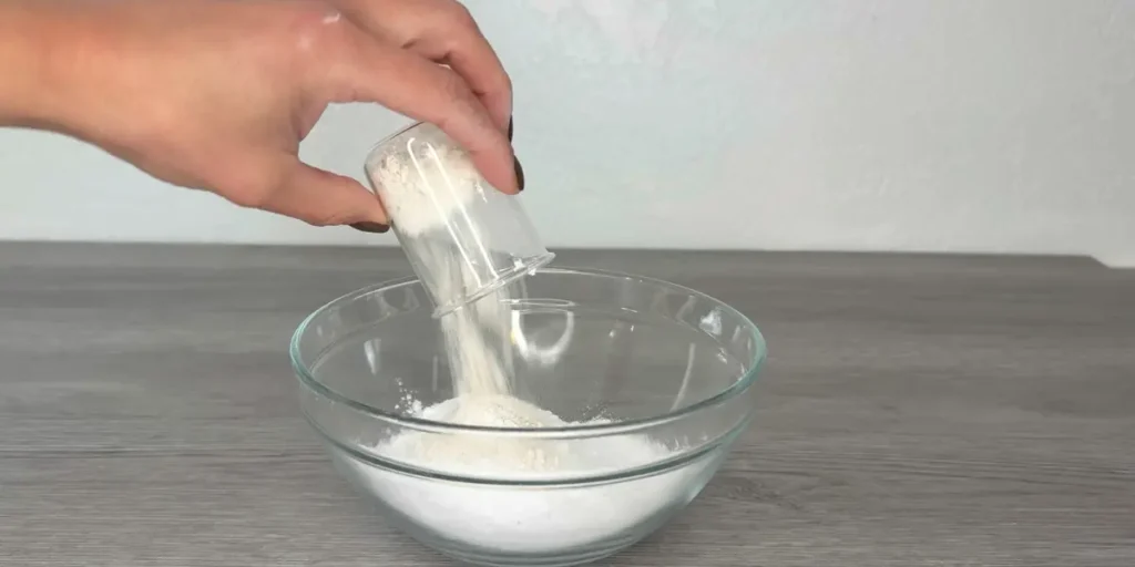 adding dry ingredients for shower steamer