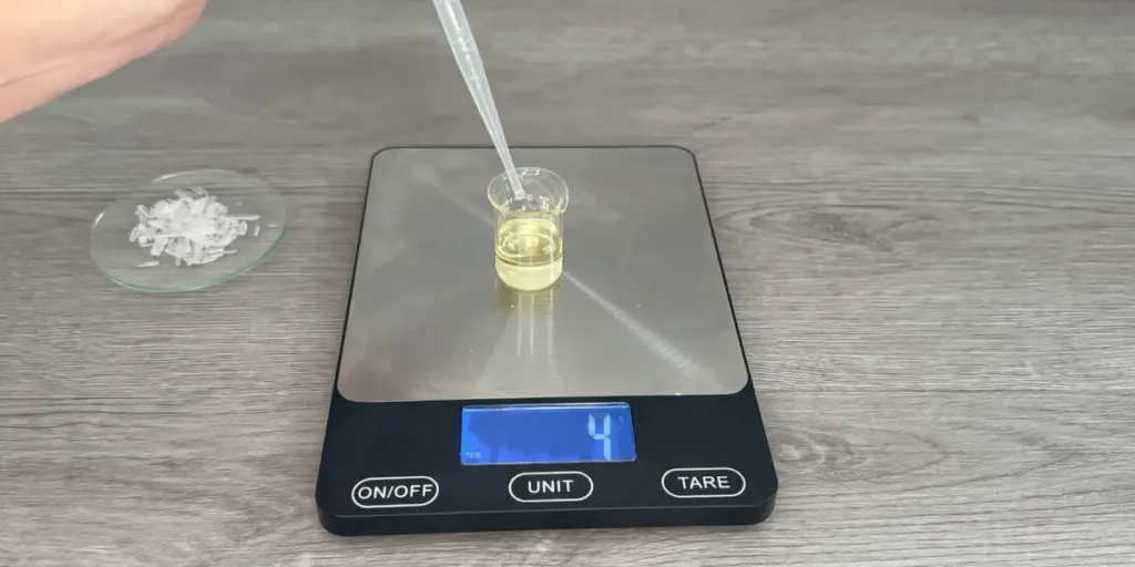 weighing fragrance oil for shower steamer